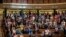 Spain's Prime Minister Pedro Sanchez, foreground left, applauds after the approval to an amnesty law at the Spanish parliament's lower house in Madrid, May 30, 2024. 
