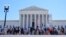 People protest outside the Supreme Court, July 1, 2024, in Washington. 