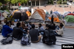 FILE - Students attend a protest encampment in support of Palestinians at University of California, Berkeley during the ongoing conflict between Israel and the Palestinian Islamist group Hamas, in Berkeley, U.S., April 25, 2024. (REUTERS/Carlos Barria)