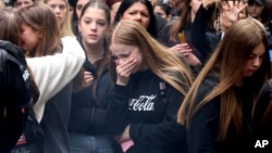 Students gathered May 4, 2023, in Belgrade, Serbia, to honor those killed and injured a day earlier in a shooting rampage at a school in Belgrade.