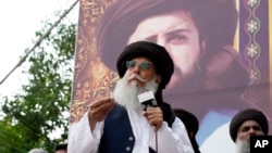 Zaheerul Hassan Shah, the deputy chief of a radical Islamist party, speaks to his supporters during a gathering in Lahore, Pakistan, July 28, 2024. Pakistan's police arrested Shah on July 29 on the charge of ordering the killing of the chief justice, officials said. 