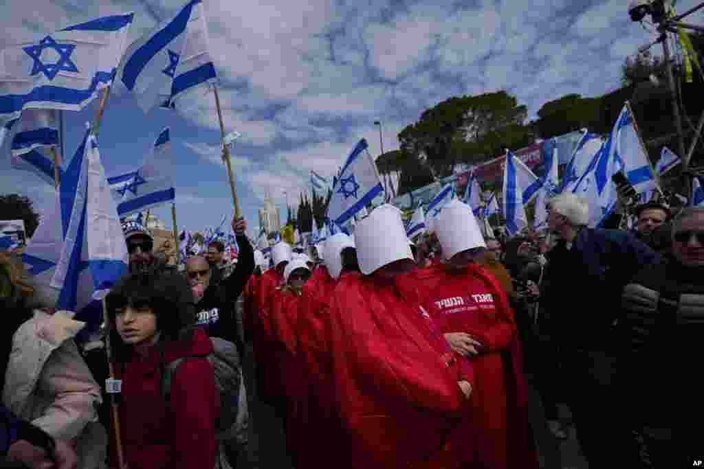 Israelis protest against plans by Prime Minister Benjamin Netanyahu&#39;s new government to overhaul the judicial system, outside the Knesset, Israel&#39;s parliament, in Jerusalem.