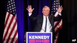 Independent presidential candidate Robert F. Kennedy Jr. waves to supporters after speaking at a campaign stop in Austin, Texas, May 13, 2024.