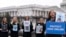FILE - Women hold photos of their loved ones during a rally to protect kids online on Capitol Hill in Washington, Jan. 31, 2024. The U.S. Senate passed major online child safety reforms on July 30, 2024. The bills' future in the House of Representatives is uncertain.