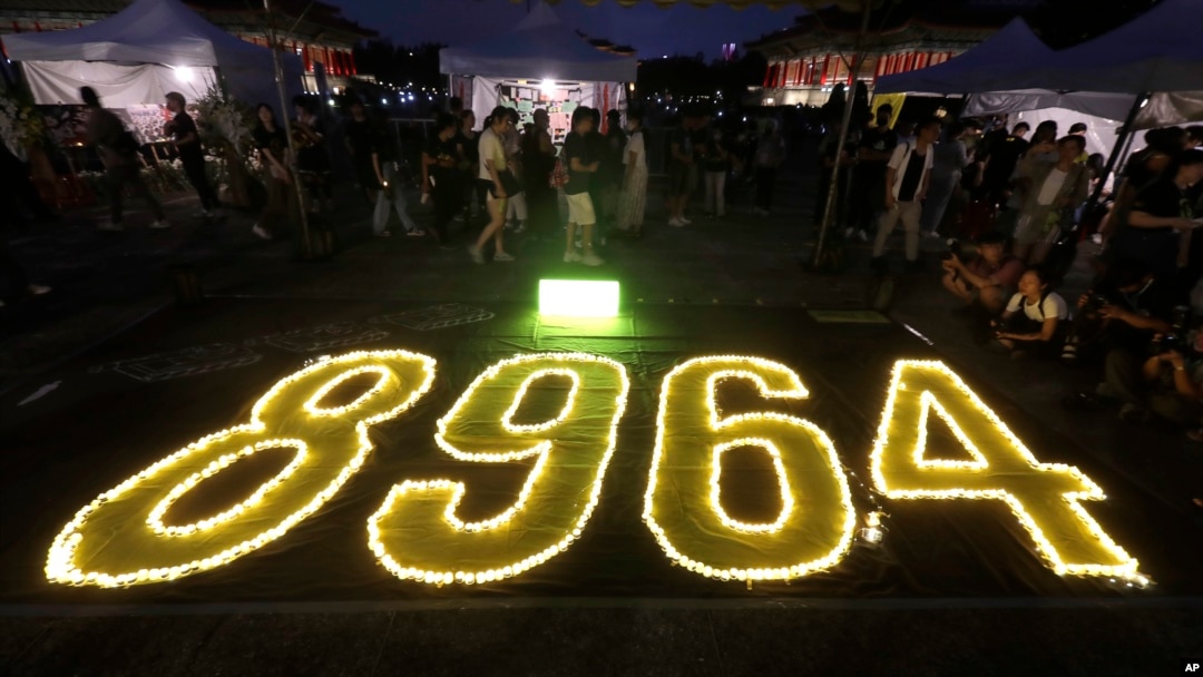 Hundreds of participants attend a candlelight vigil at Democracy Square in Taipei, Taiwan, June 4, 2023, to mark the 34th anniversary of the Chinese military crackdown on the pro-democracy movement in Beijing's Tiananmen Square. 