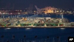 FILE - Loading docks at the Port of Los Angeles, Nov. 21, 2022. Los Angeles and Shanghai formed a partnership to create a green shipping corridor for the shipping industry.