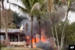 Cuplikan dari video UGC yang disediakan oleh Felipe Magalhaes Filho menunjukkan kebakaran pesawat yang jatuh dan menabrak sebuah rumah di Vinhedo, negara bagian Sao Paulo, Brazil, Jumat, 9 Agustus 2024. (Felipe Magalhaes Filho via AP)