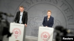 Denmark's Prime Minister Mette Frederiksen, right, and Deputy Prime Minister and Minister of Defense Troels Lund Poulsen hold a press conference on defense cooperation with the US, in Copenhagen, Denmark, Dec. 19, 2023.