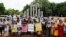 Relatives of the people who disappeared during the reign of Awami League, gather to demand justice at the Shaheed Minar, in Dhaka, Aug. 11, 2024. 