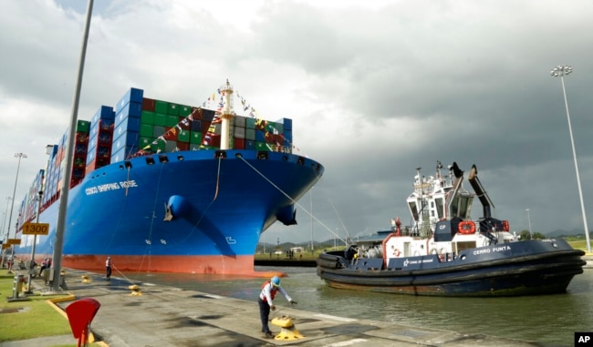 FILE - The Chinese container ship Cosco docks at the Cocoli Locks in Panama City, Dec. 3, 2018.