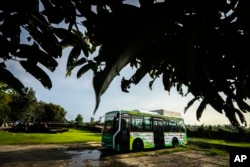 A bus that runs on green hydrogen sits at a hydrogen plant at Oil India Limited in Jorhat, India, on Aug. 17, 2023.