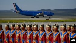 The plane carrying Pope Francis lands at Ulaanbaatar's international airport Chinggis Khaan, Sept. 1, 2023.