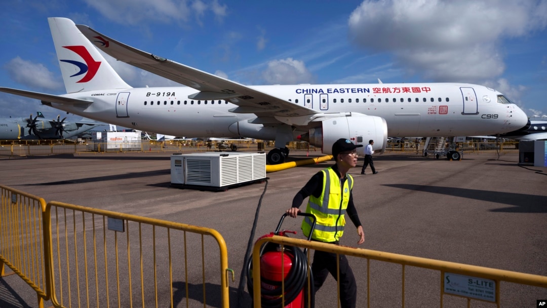 FILE - A COMAC C919 aircraft is displayed during the Singapore Airshow, Feb. 20, 2024. The Chinese aerospace company has showcased its passenger jet as it prepares to take on Airbus and Boeing the single-aisle commercial aircraft market.