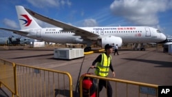 FILE - A COMAC C919 aircraft is displayed during the Singapore Airshow, Feb. 20, 2024. The Chinese aerospace company has showcased its passenger jet as it prepares to take on Airbus and Boeing the single-aisle commercial aircraft market.