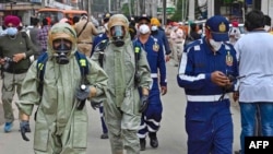 National Disaster Response Force (NDRF) personnel arrive to inspect the gas leak accident at a factory in Ludhiana, Apr. 30, 2023. 