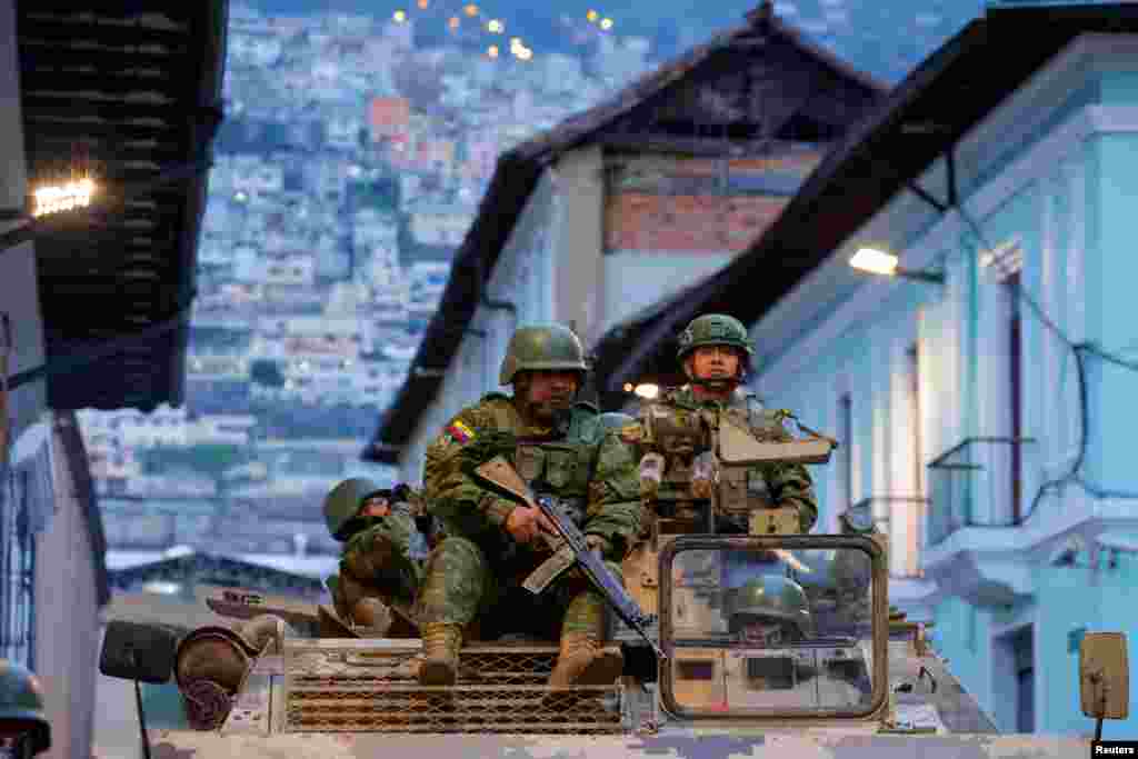 Soldiers in an armored vehicle patrol the city&#39;s historic center following an outbreak of violence in Quito, Ecuador, Jan. 9, 2024.&nbsp;&nbsp;President Daniel Noboa declared a 60-day state of emergency following the disappearance of Adolfo Macias, leader of the Los Choneros criminal gang, from the prison where he was serving a 34-year sentence,