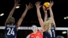 Li Yingying of China spikes the ball as Chiaka Ogbogu and Andrea Drews of the United States try to block her during the group A women's volleyball match between the United States and China at the 2024 Summer Olympics, July 29, 2024, in Paris.