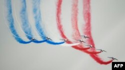 Alphajet aircrafts from the French elite acrobatic flying team &quot;Patrouille de France&quot; perform as they fly over the 701 Air Base in Salon-de-Provence, southern France.
