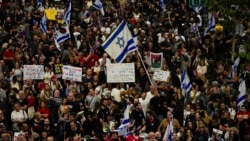 People protest against Israeli Prime Minister Benjamin Netanyahu's government and call for the release of hostages held in the Gaza Strip by the Hamas militant group in Tel Aviv, Israel, April 27, 2024. 