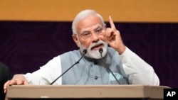 FILE - Indian Prime Minister Narendra Modi speaks during the inauguration of SemiconIndia 2023 in Gandhinagar, India, July 28, 2023. 