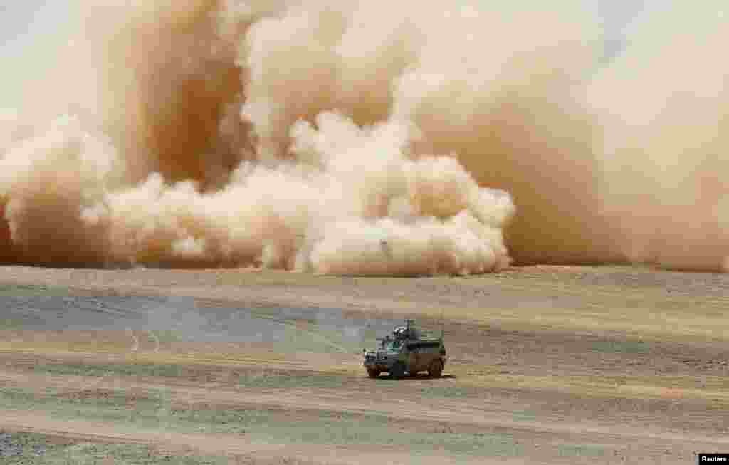 A military vehicle drives during the &#39;Eager Lion&#39; joint military drills with the participation of the Jordanian Armed Forces, the U.S. and other partner countries, in Maan, Jordan.