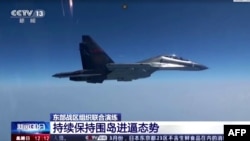 Kina simulira napad na Tajvan drugog dana svojih vojnih vježbi oko Tawaina 9. aprila 2023. Snimak ekrana iz AFP videa.