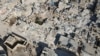 An aerial view shows collapsed buildings following last week's earthquake in Syria's rebel-held village of Atarib, in the northwestern Aleppo province, Feb. 14, 2023. 