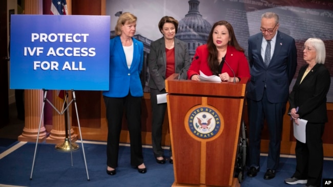 Sen. Tammy Duckworth, of Illinois speaks about a bill to establish federal protections for IVF as, from left, Sen. Tammy Baldwin, Sen. Amy Klobuchar, Senate Majority Leader Chuck Schumer and Sen. Patty Murray listen Feb. 27, 2024, in Washington.