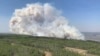 FILE - In this photo provided by the Government of Alberta Fire Service, a wildfire burns a section of forest in the Grande Prairie district of Alberta, Canada, May 6, 2023. Alberta faces another hot, dry weekend, with warnings of more intense wildfires.