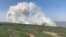 In this photo provided by the Government of Alberta Fire Service, a wildfire burns a section of forest in the Grande Prairie district of Alberta, Canada, May 6, 2023. 
