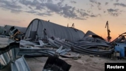 Grain warehouses heavily damaged by a Russian drone attack are seen at a compound of a port on the Danube, amid Russia's attack on Ukraine, in Odesa region, Ukraine August 16, 2023. (Press Service of the Operational Command South of the Ukrainian Armed Forces/Handout via REUTERS)