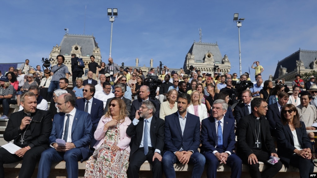 Religious leaders and other personalities attend an interreligious meeting on the parvis of Notre Dame de Paris cathedral in Paris on Aug. 4, 2024. 