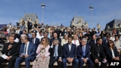Religious leaders and other personalities attend an interreligious meeting on the parvis of Notre Dame de Paris cathedral in Paris on Aug. 4, 2024. 