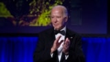 US President Joe Biden applauds at the conclusion of the White House Correspondents' Association Dinner at the Washington Hilton, April 27, 2024, in Washington. 