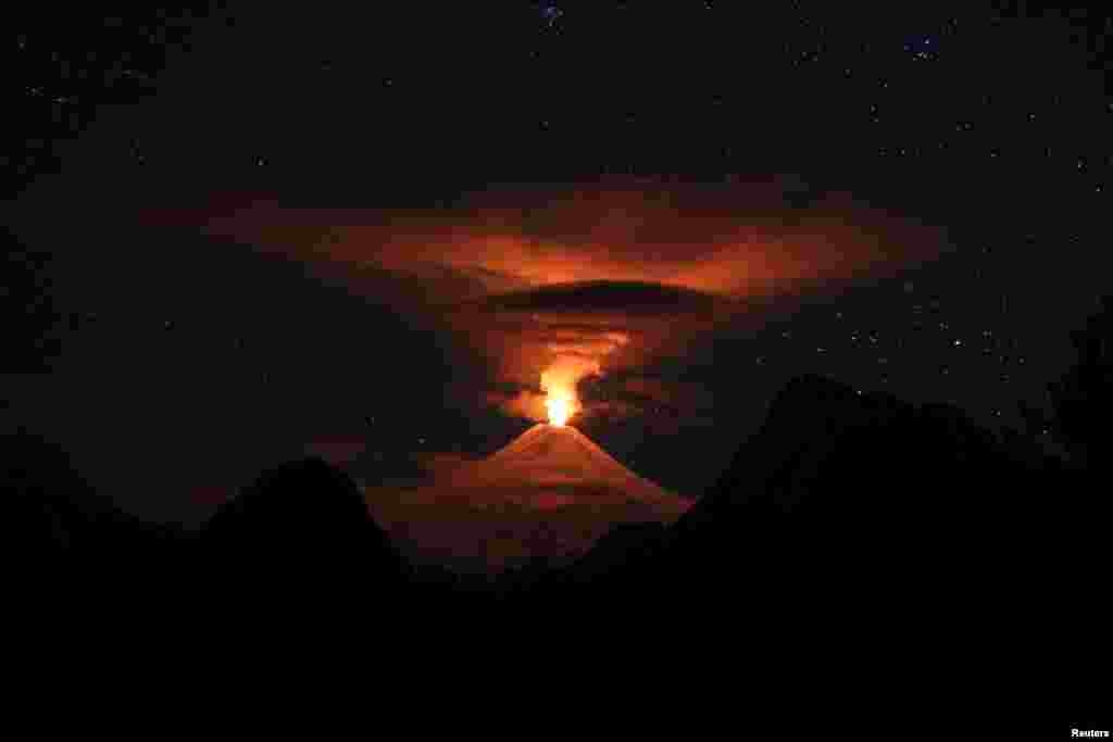 A view shows activity of the Villarrica volcano during the night, as seen from Pucon, Chile, May 12, 2024.