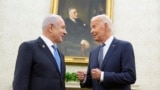 U.S. President Joe Biden, right, meets with Israeli Prime Minister Benjamin Netanyahu in the Oval Office of the White House in Washington, July 25, 2024. 