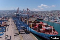 FILE - A general view shows Haifa Port, which is to be sold to India's Adani Ports and local partner Gadot in Haifa, Israel, July 24, 2022.