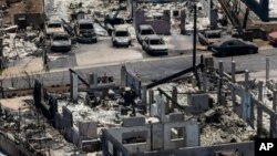 FILE - A general view shows the aftermath of a devastating wildfire in Lahaina, Hawaii, Aug. 22, 2023.