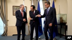Cypriot President Nikos Christodoulides, center, Greek PM Kyriakos Mitsotakis, right, and Israeli PM Benjamin Netanyahu, left, after meeting on infrastructure ideas in Nicosia, Cyprus, Sept. 4, 2023.
