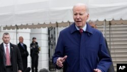 President Joe Biden walks towards reporters on the South Lawn of the White House in Washington, March 3, 2023.