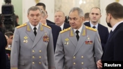 والری گراسیموف، رئیس ستاد ارتش روسیه، و سرگئی شویگو، وزیر دفاع پیشین روسیه.