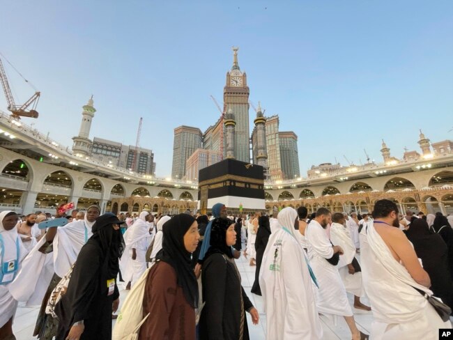 Muslim pilgrims circumambulate around the Kaaba, the cubic building originally built by the Archprophet Abraham, at the Grand Mosque, during the annual hajj pilgrimage in Mecca, Saudi Arabia, June 26, 2023, before heading to Mina in preparation for the Hajj, the fifth pillar of Islam and one of the largest religious gatherings in the world.