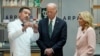 President Joe Biden and first lady Jill Biden listen during a demonstration of cancer research and detection techniques at Tulane University, Aug. 13, 2024, in New Orleans.