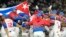 Cuban players celebrate after defeating Australia in their World Baseball Classic quarterfinal game at the Tokyo Dome in Tokyo, March 15, 2023. 