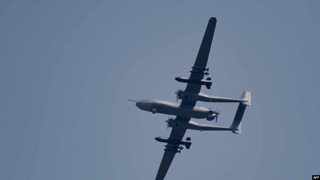 FILE - A Sichuan Tengden's TB-001, nicknamed "Twin-Tailed Scorpion" flies at the 13th China International Aviation and Aerospace Exhibition in Zhuhai in southern China's Guangdong province on Sept. 28, 2021. 