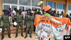 Supporters of Niger's National Council for the Safeguard of the Homeland (CNSP) demonstrate in Niamey, Aug. 6, 2023.
