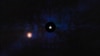 The exoplanet Epsilon Indi Ab is seen with NASA’s Webb Space Telescope’s MIRI (Mid-Infrared Instrument). A star symbol marks the host star Epsilon Indi A, whose light has been blocked by a coronagraph, resulting in the dark circle marked with a dashed white line. 