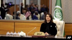 FILE - Libya's Tripoli-based administration Foreign Minister Najla Mangoush attends a meeting with other Arab Foreign Ministers in the capital Tripoli, Jan. 22, 2023.