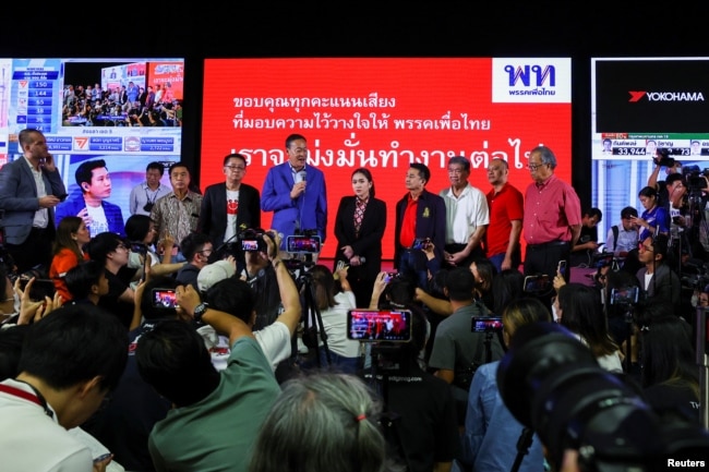 Leaders of the Pheu Thai Party speak to the media after the polling stations closed on the day of the general elections in Bangkok, Thailand, May 14, 2023. (REUTERS/Athit Perawongmetha)