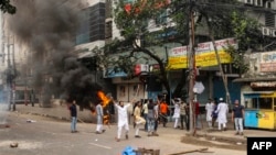 Protesters clash with police during the ongoing anti-quota protest in Dhaka on July 19, 2024.